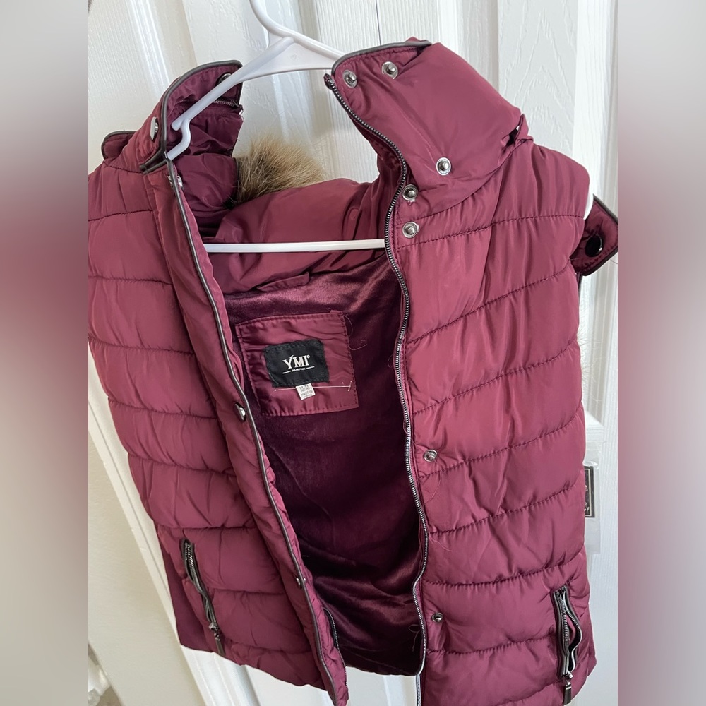 Sleeveless puffer coat. Never worn
